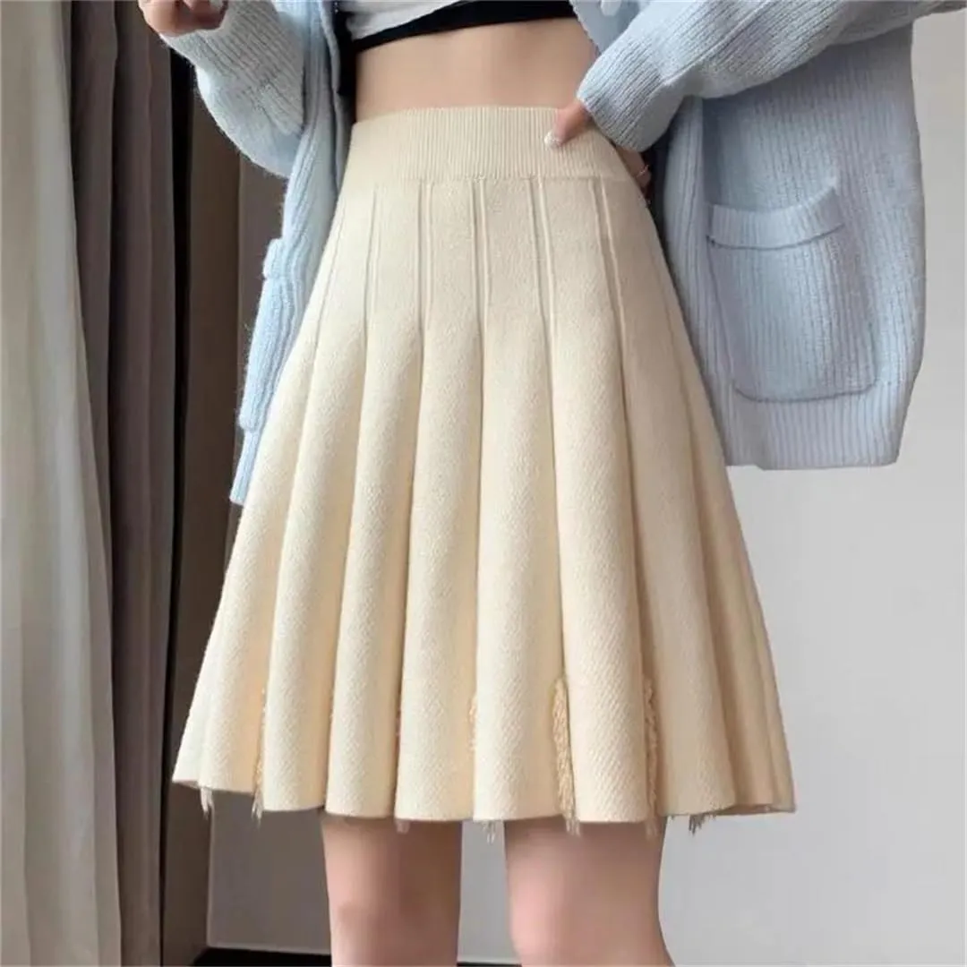 Women's Solid Color Tassel Knitted Pleated Skirt Stretch High Waist A-Line Mini Skirts